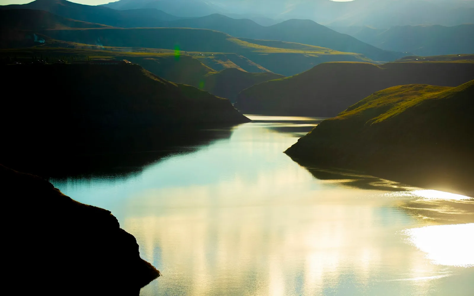 Green mountain landscape and lake in Lesotho